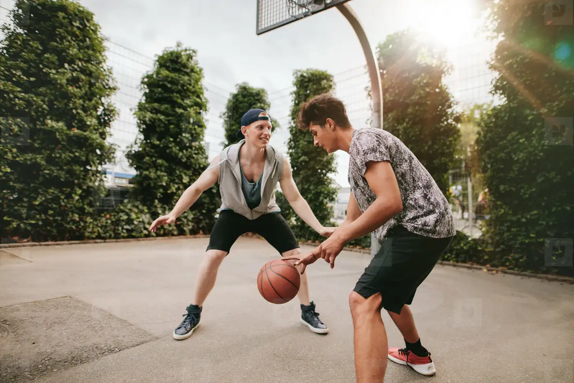 Teenagers Playing Basketball On Outdoor Court Photo (124209