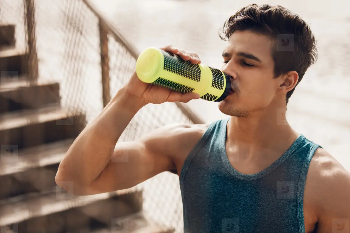 Runner Drinking Water After Exercising Photo (124772) - YouWorkForThem, image size:1184x789