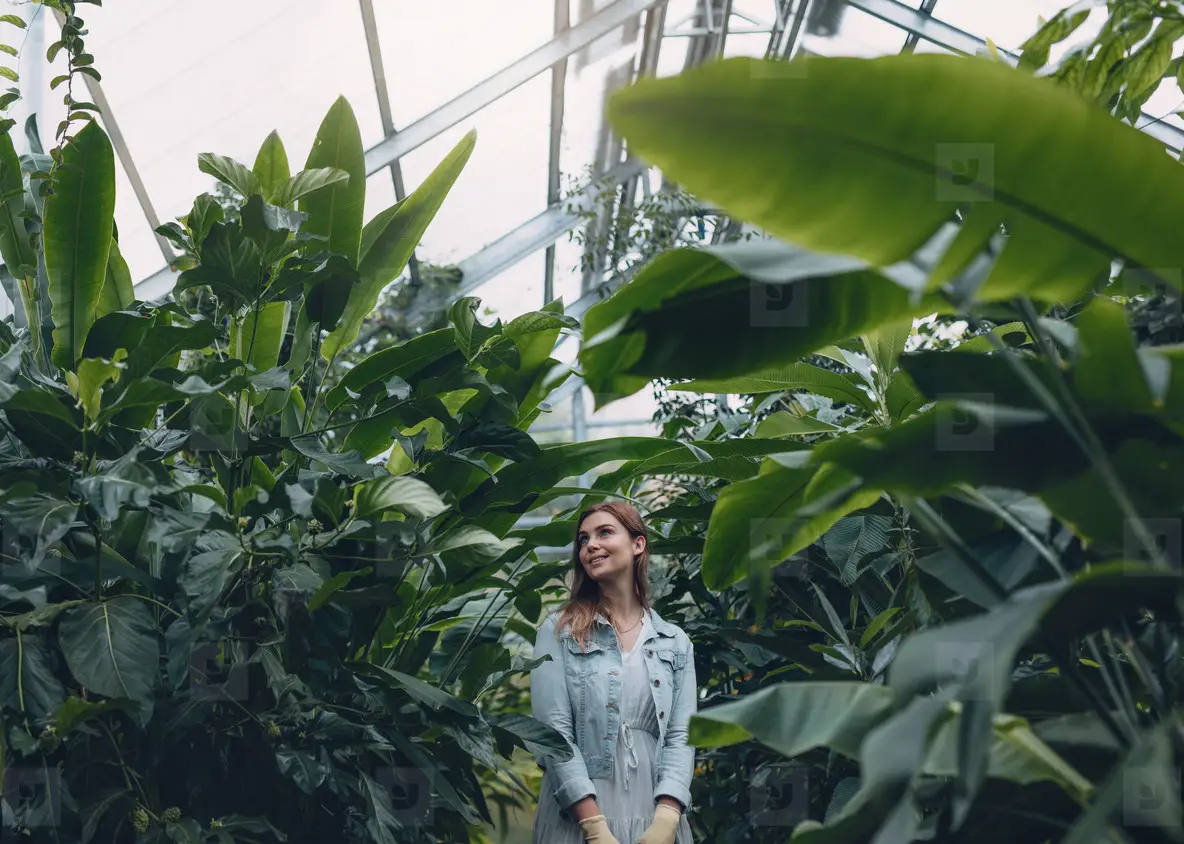 Beautiful Woman Working In Greenhouse Photo (131652) - YouWorkForThem