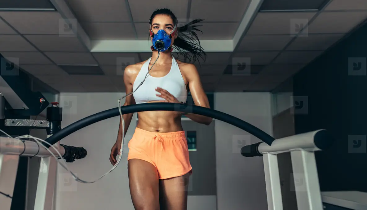 Runner testing her performance in sports science lab