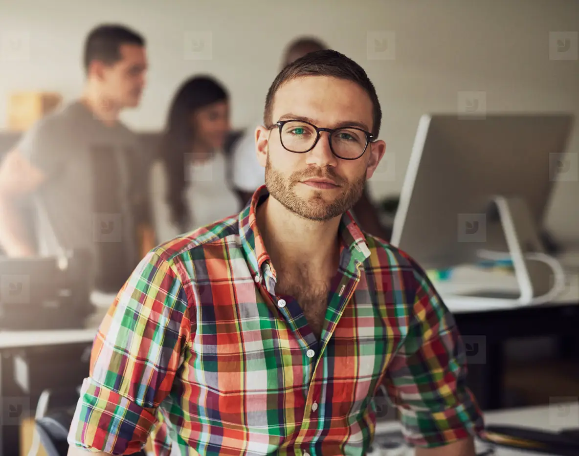 Young Businessman Wearing Glasses In The Office Photo (137562