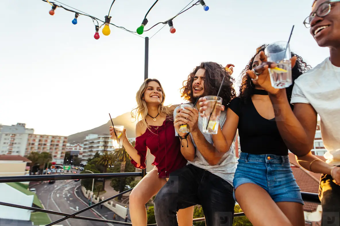 Young People Partying On Terrace With Drinks Photo (142029) - YouWorkForThem