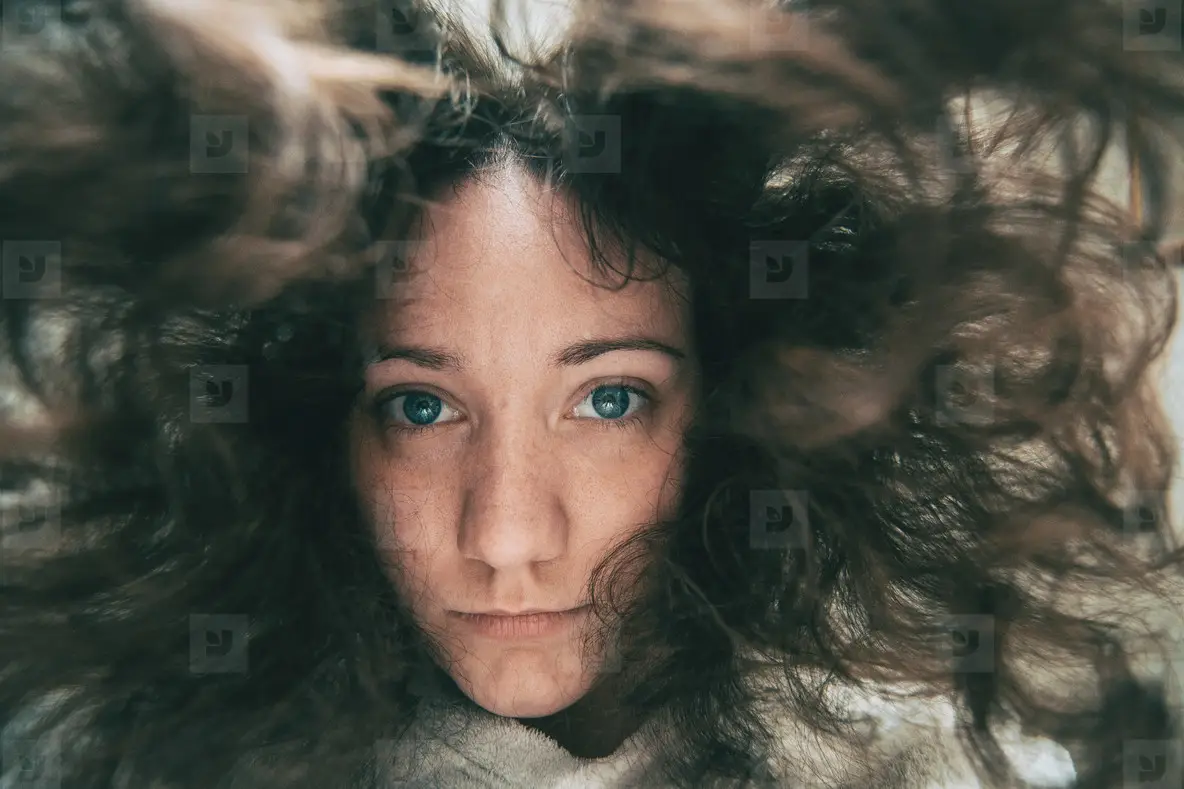 A Girl Looking At The Camera Face Down Photo (146048) YouWorkForThem