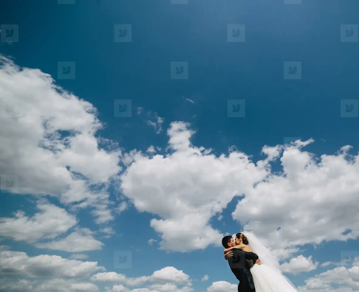 Couple On Blue Sky Background Photo (154451) - YouWorkForThem