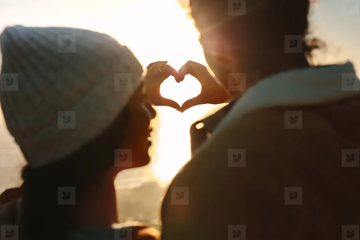 Romantic Couple Making Heart With Hands Photo (156277) - YouWorkForThem