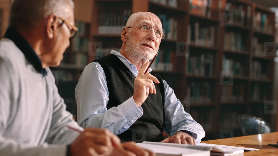 Senior colleagues discussing in college