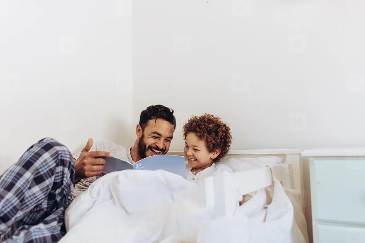 Father and son spending time together at home