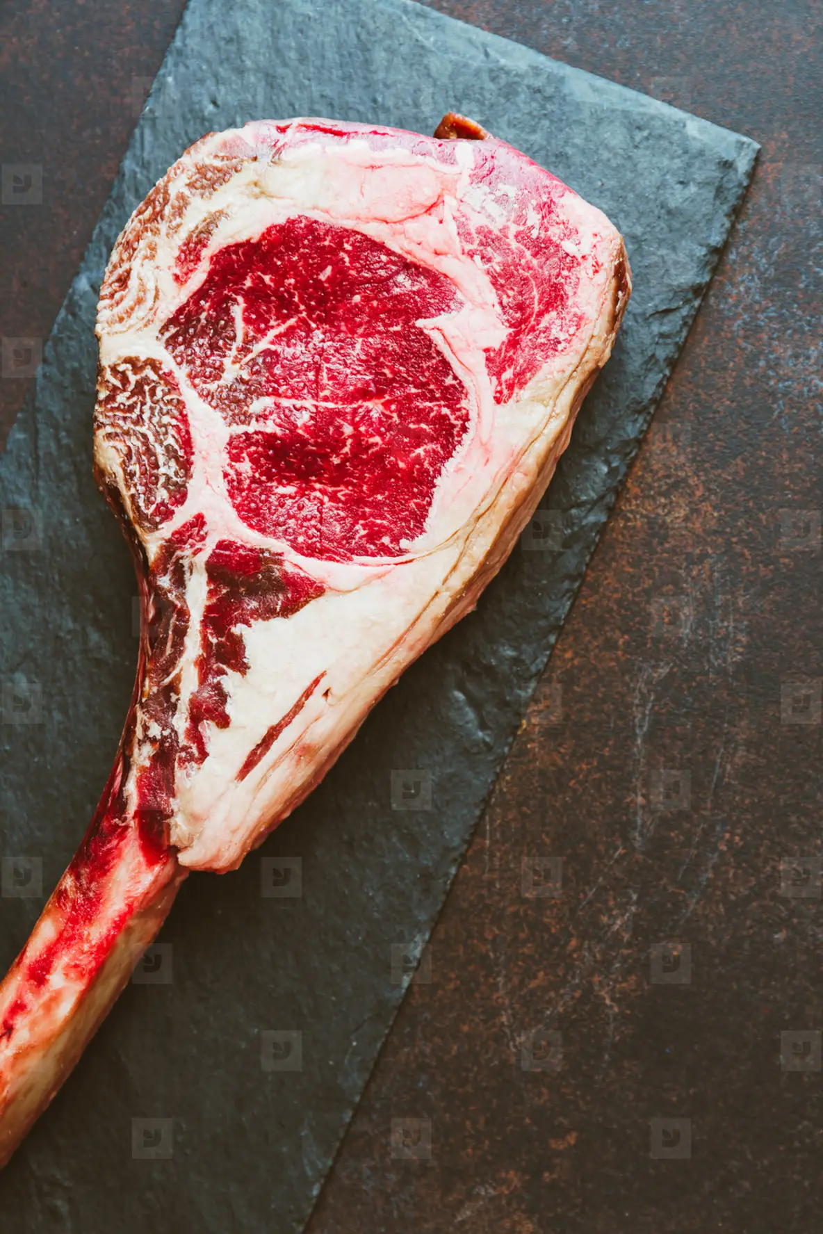 Top view of raw dry aged marble beef steak Tomahawk  Flat lay  cooking concept