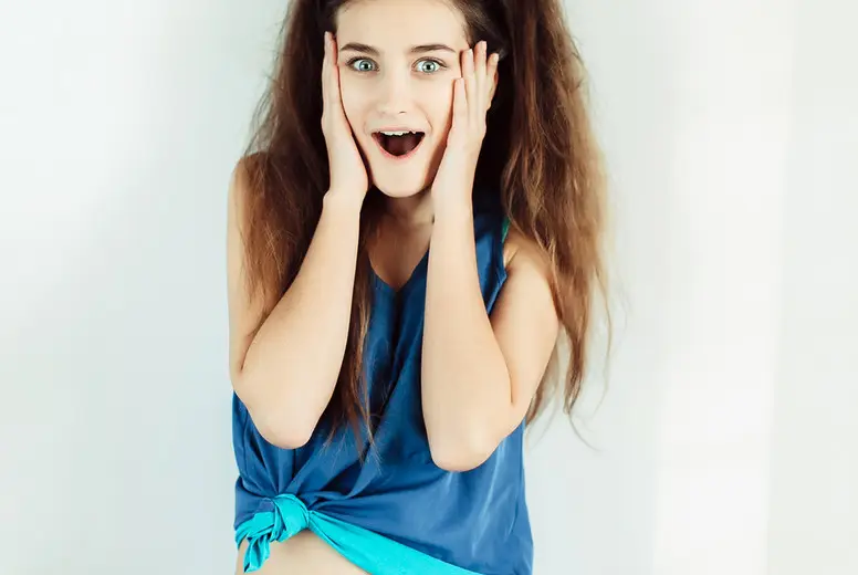 Surprised Young Girl With Pigtails Photo (174516) - YouWorkForThem