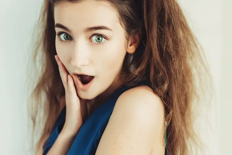 Surprised Young Girl With Pigtails Photo (174517) - YouWorkForThem