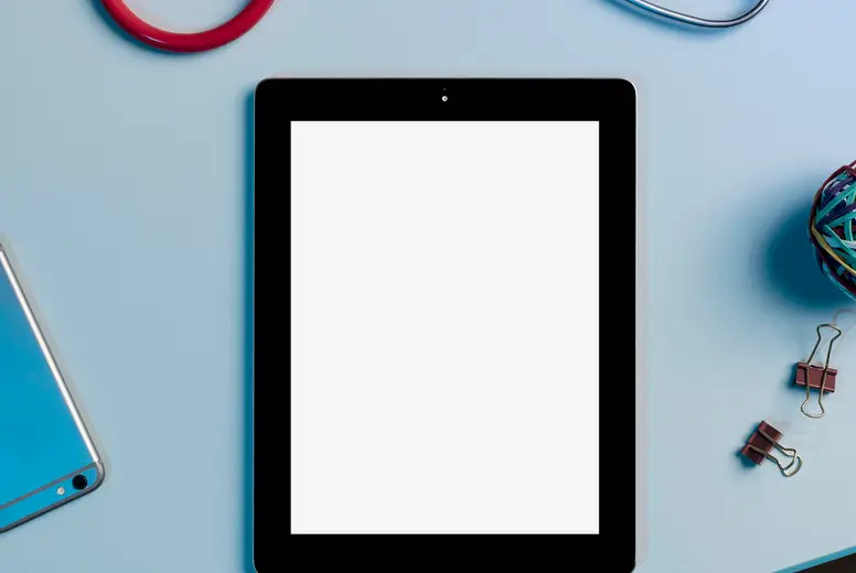 View form above digital tablet surrounded by x-rays and stethoscope on desk #01