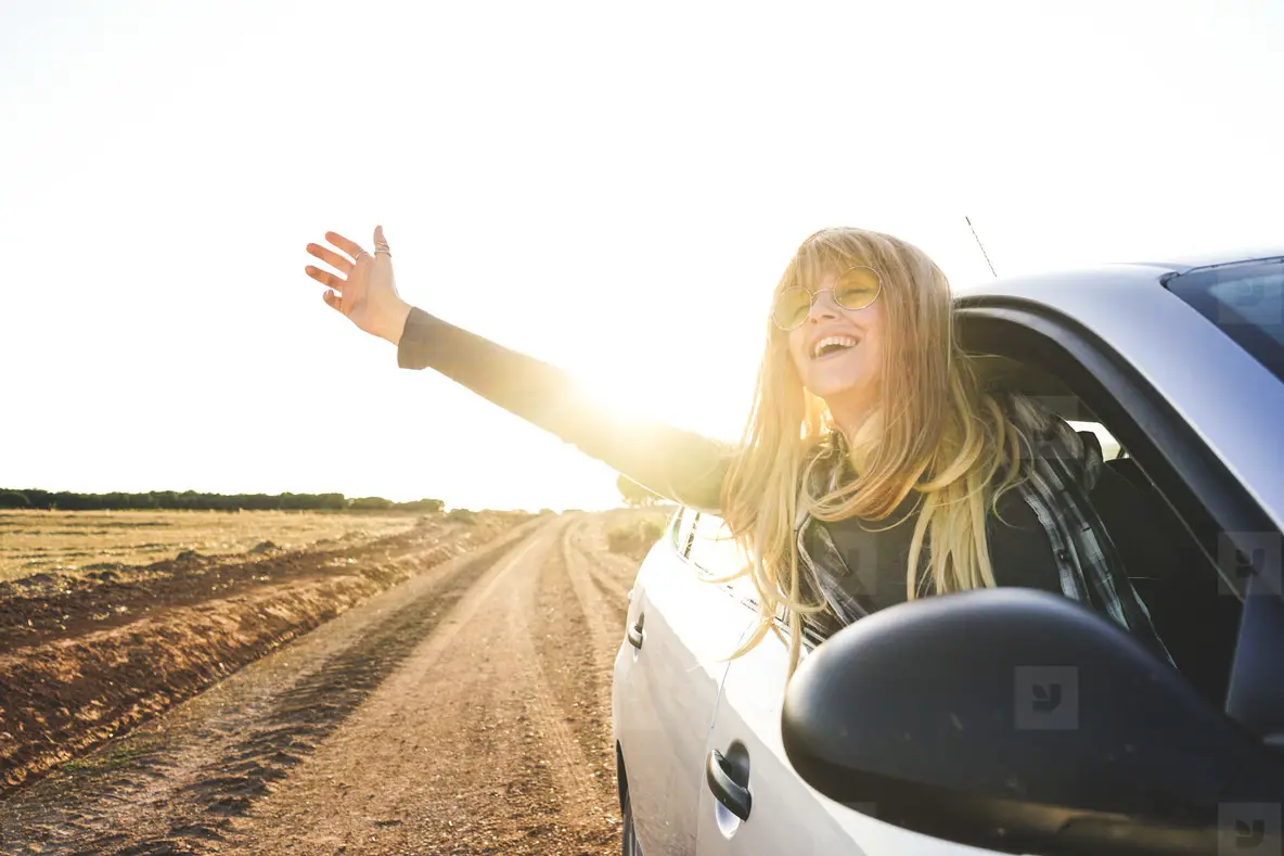 Young Woman In A Road Trip Enjoying The Journey Photo (180597 ...