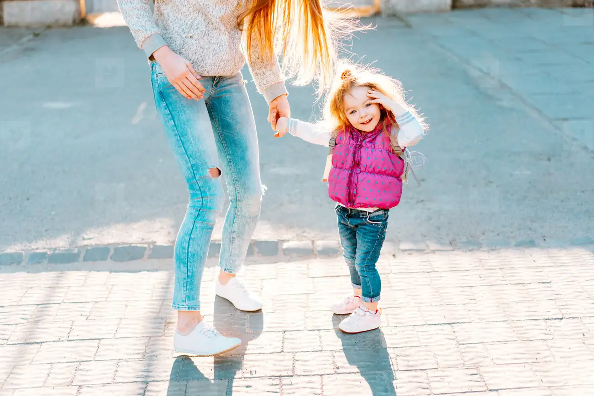 Mom and girl playing  having fun