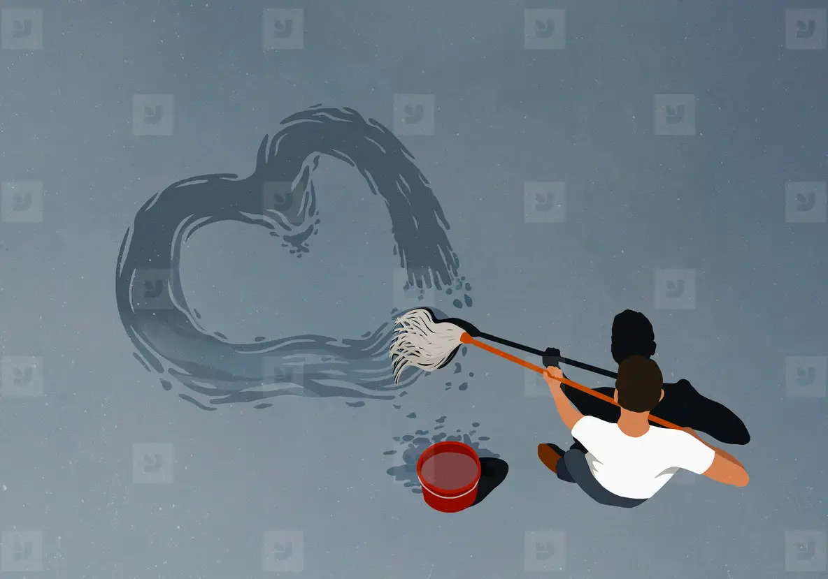Man drawing heart shape with mop