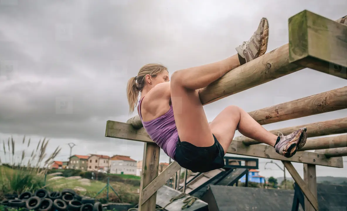 Participant in a obstacle course doing weaver