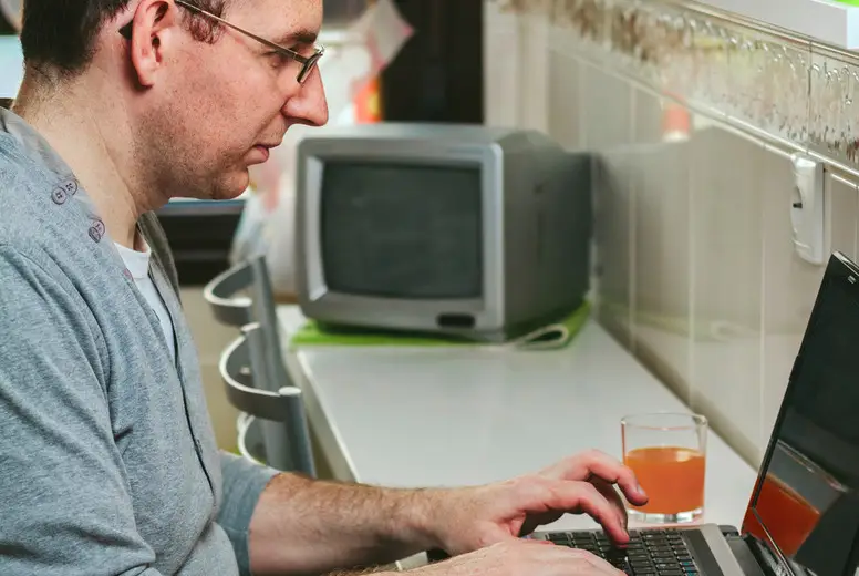 Man working from home with laptop
