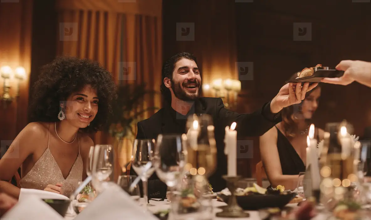 Group Of Friends Having A Dinner Party At Nightclub Photo (209736