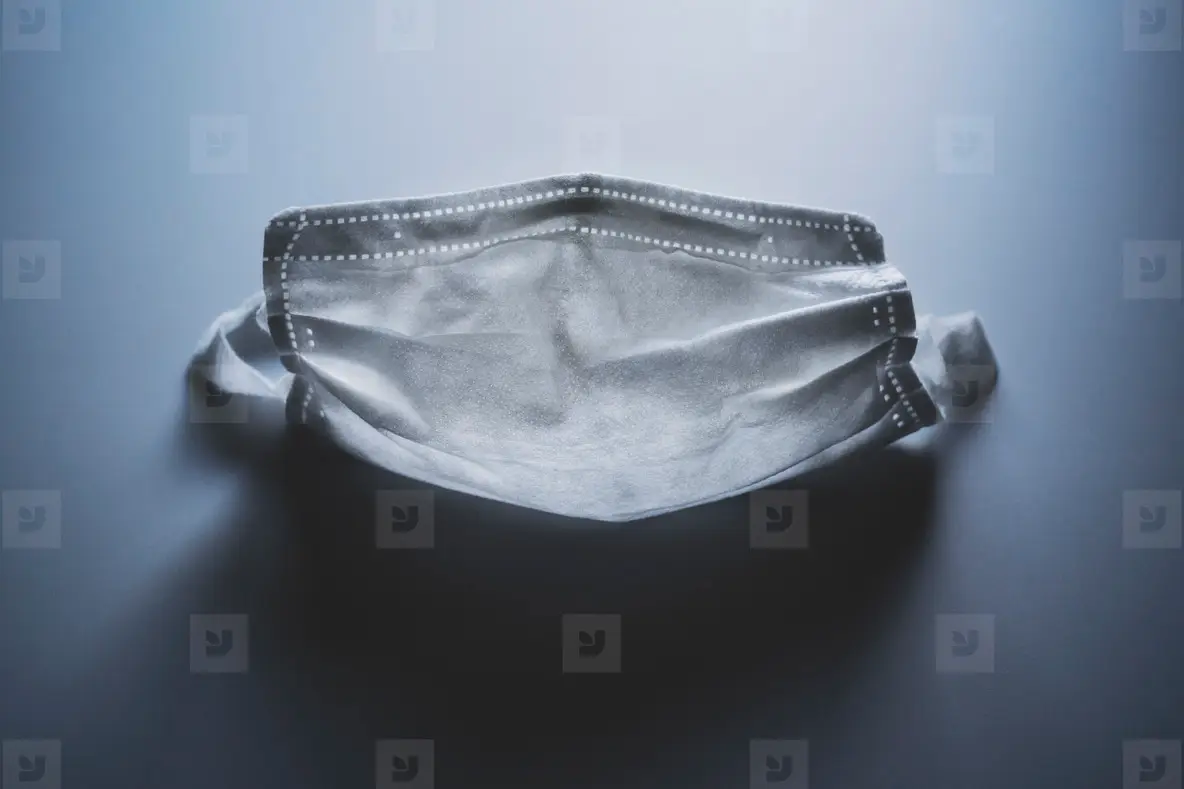 Face mask on blue background