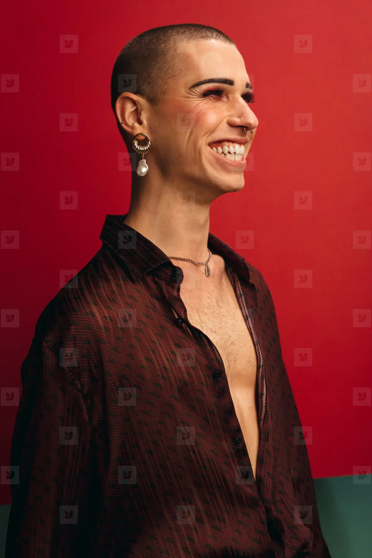 Smiling Gay Man Wearing With Earring Photo (219038
