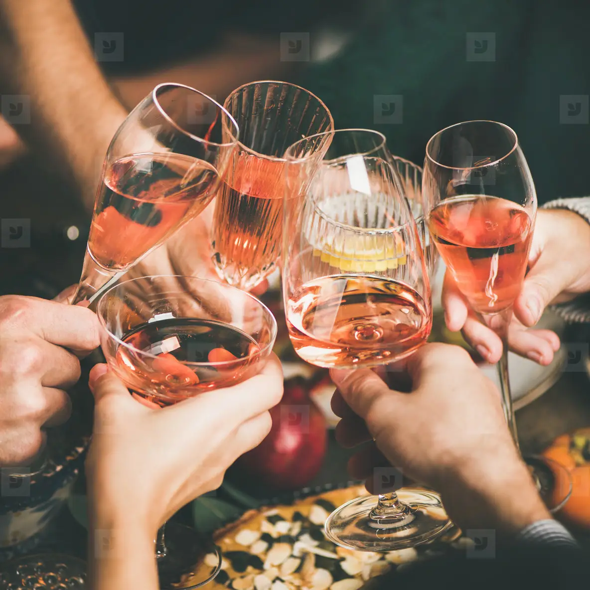 Friends Clinking Glasses With Rose Wine At Christmas, Square