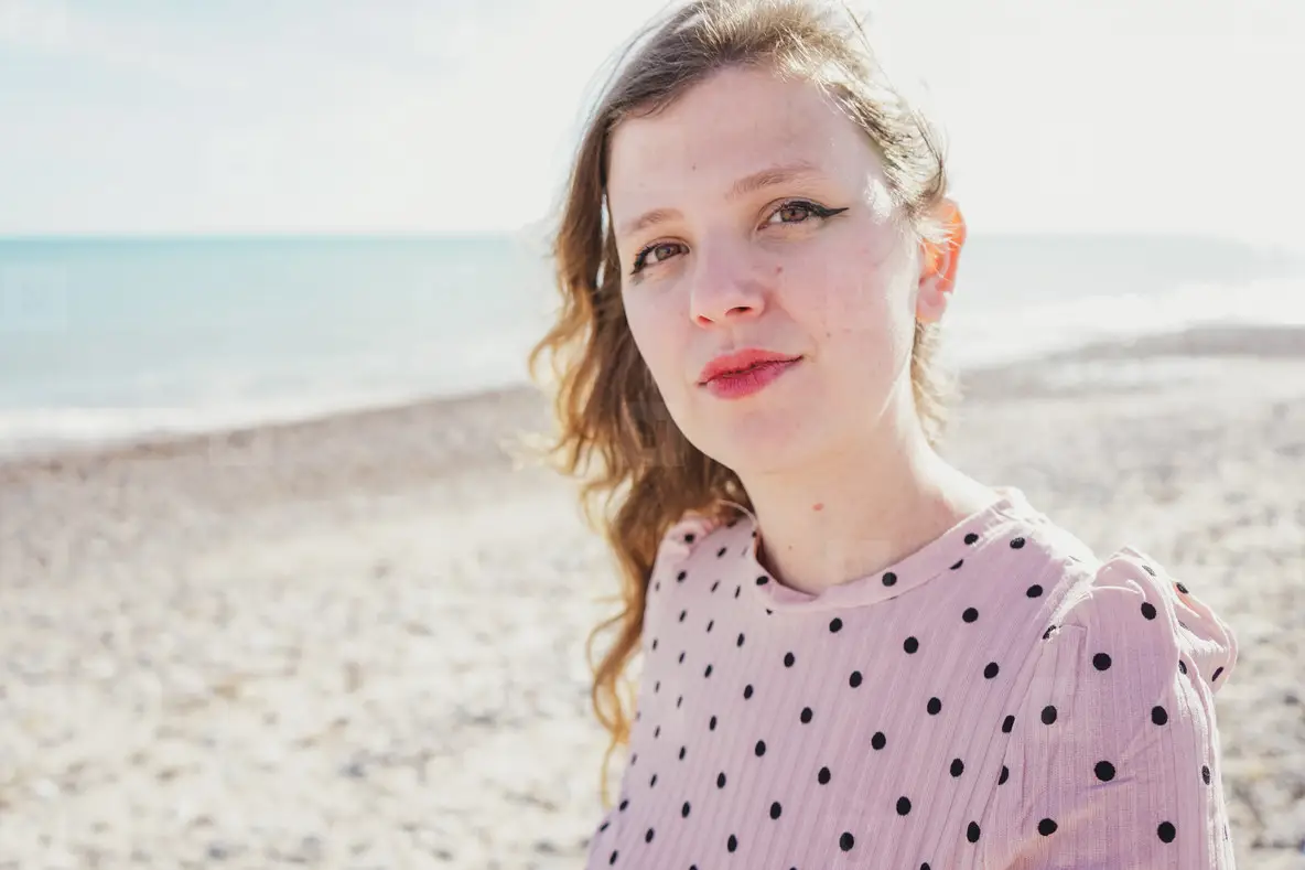 Young Woman Wearing A Pink Dress At The Beach Photo (228499 ...