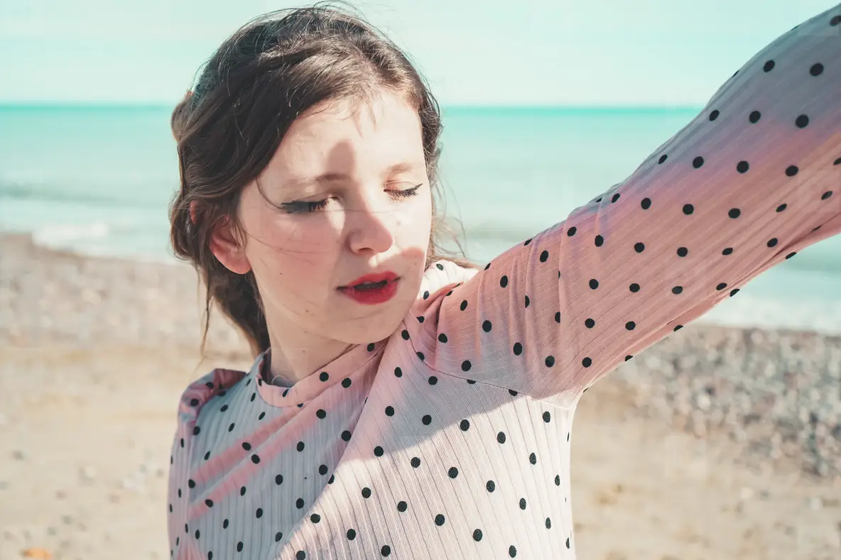 Young Woman Wearing A Pink Dress At The Beach Photo (228506 ...