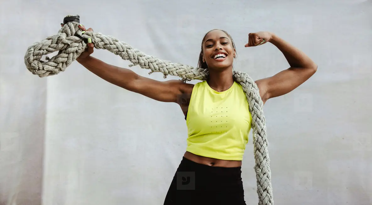 Fitness Woman Flexing Biceps After Cross Training Photo (235381