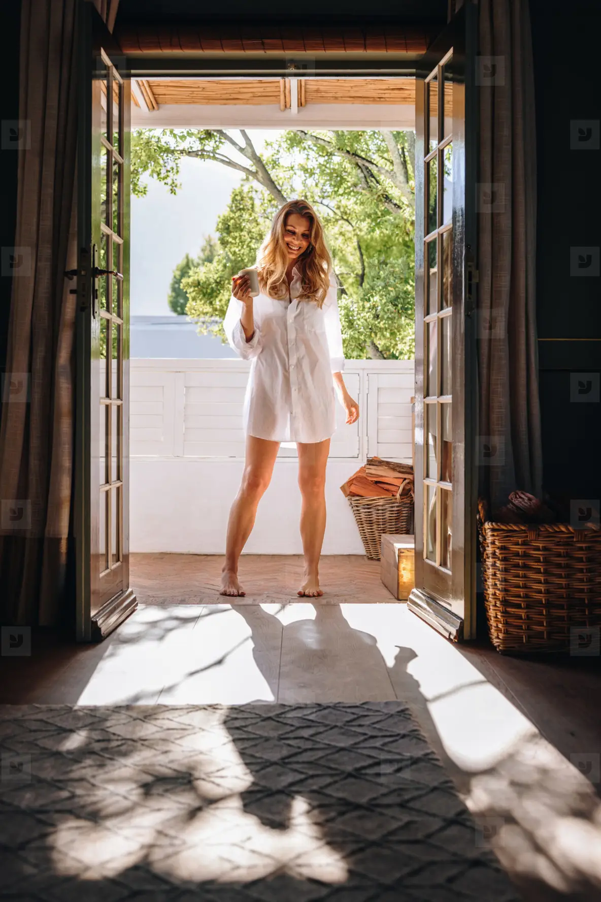 Happy Young Woman Standing At A Hotel Entrance Photo (238872 ...