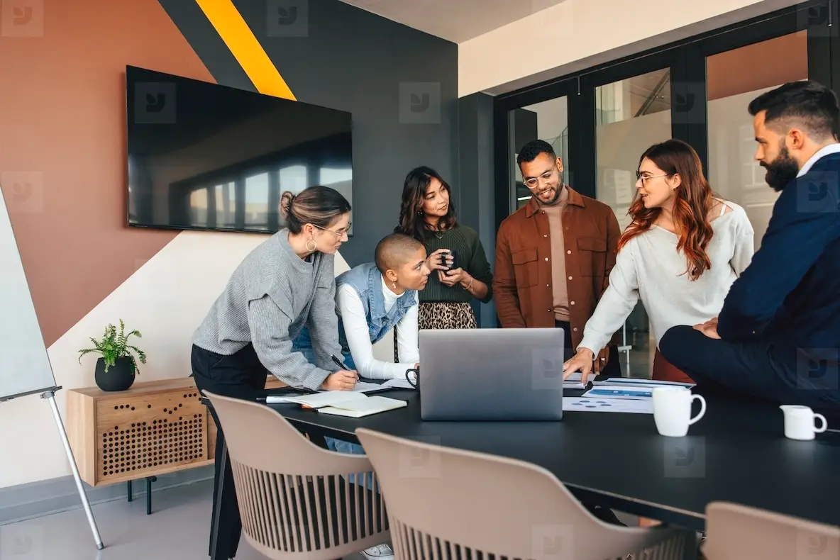 Diverse businesspeople discussing some reports in a boardroom