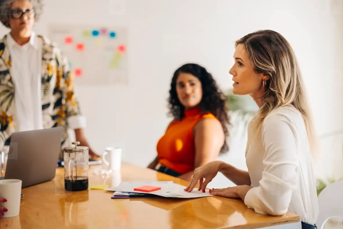 Female Business Team Having A Meeting In A Boardroom Photo (260038 ...