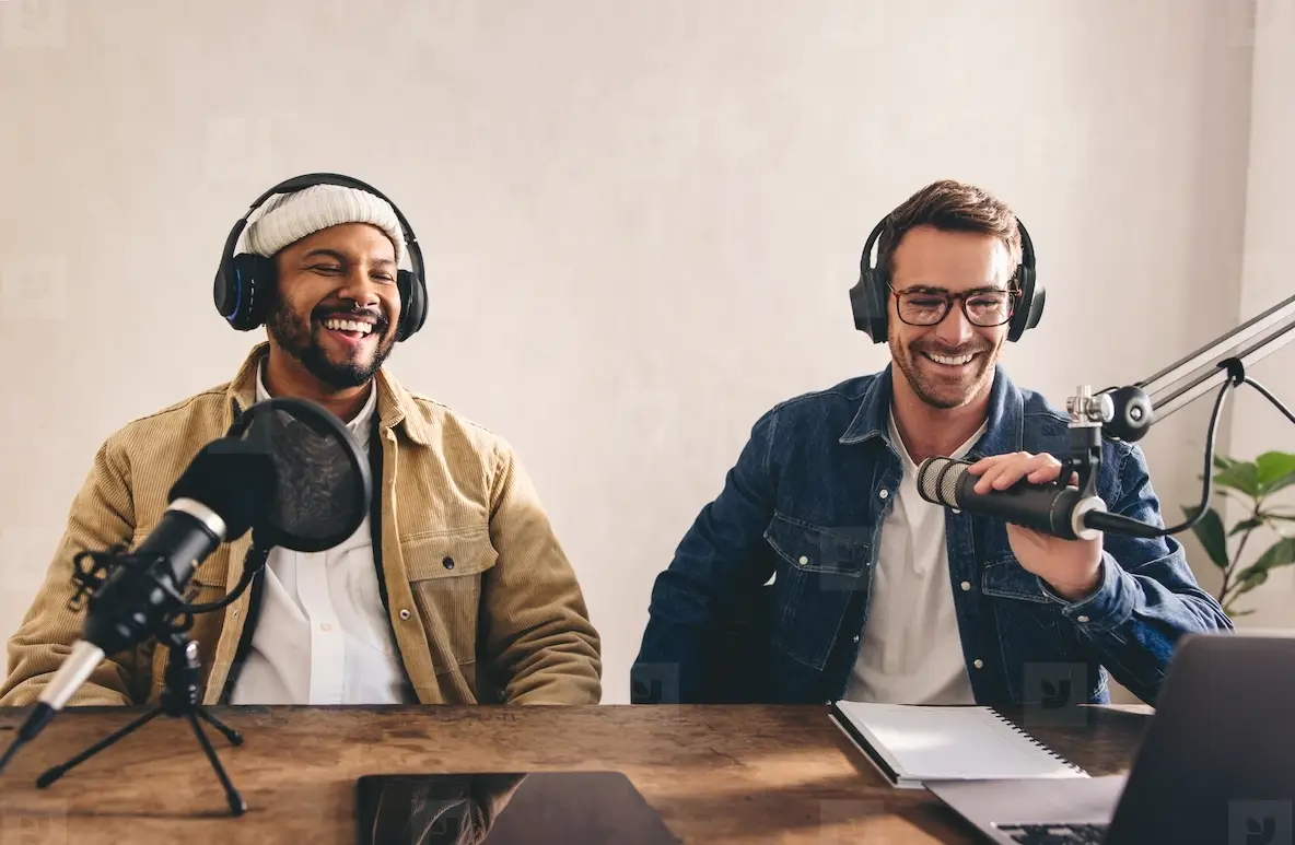 Male Radio Presenters Having A Great Time In A Studio Photo