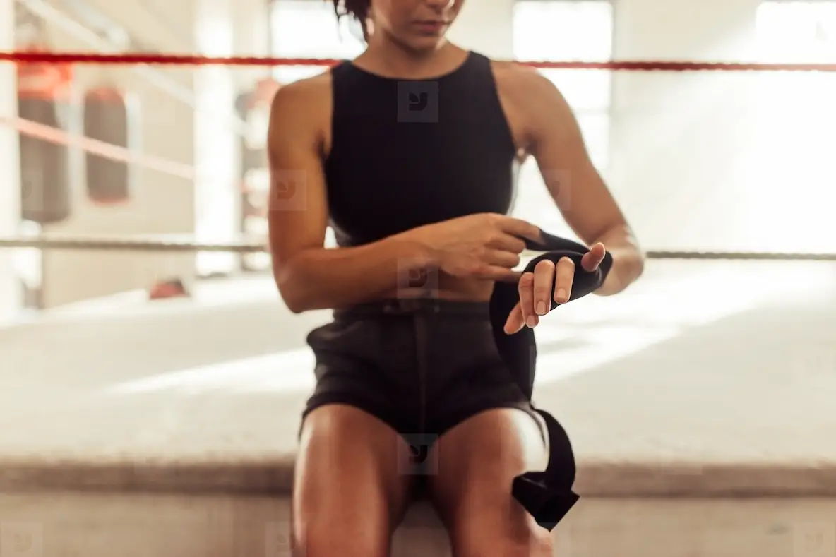 Female Athlete Sitting On The Edge Of A Boxing Ring Photo (264007 ...