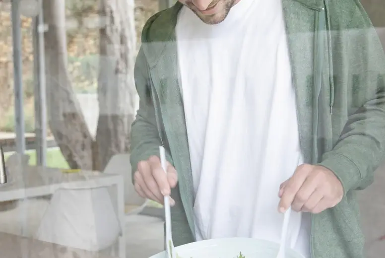 Man Tossing Salad