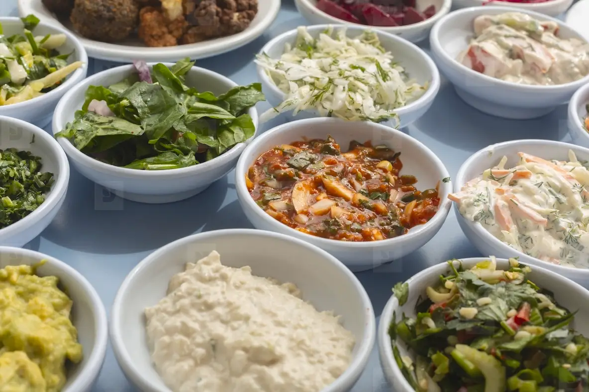 Close up still life of Israeli meze appetizers in bowls