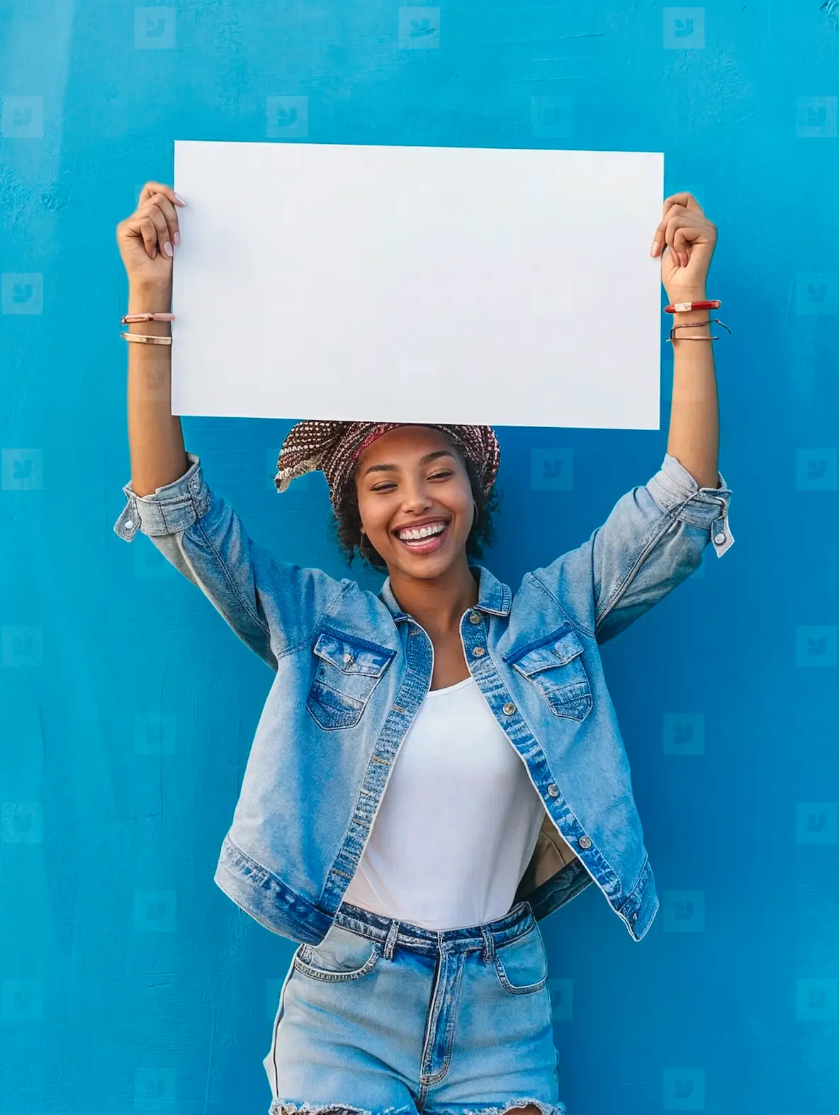 A Young Smiling Woman Holds A White Blank Sign In His Hands Photo ...