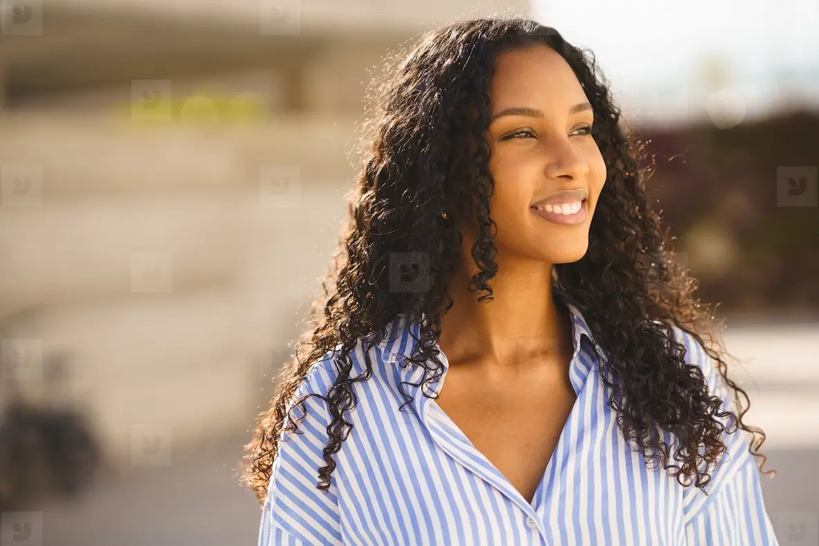 Smiling young woman using (Happy Smiling Young Woman With Shades