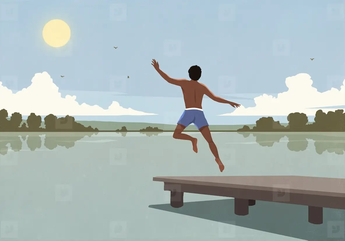 Carefree man running and jumping off dock over sunny summer lake