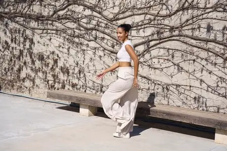 A Stunning and Elegant Fashion Portrait Set Against a Beautiful Textured Wall Background