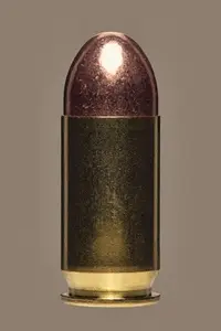 Close up studio shot of shiny 45 bullet