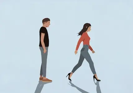 Young man watching beautiful woman in high heels walk away
