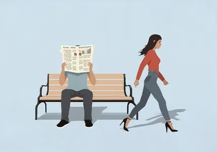 Man on bench peering through holes in newspaper