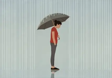Umbrella protecting depressed woman from rain
