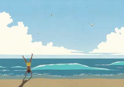 Carefree man doing handstand on sunny