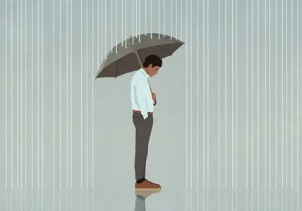 Umbrella protecting depressed man from rain