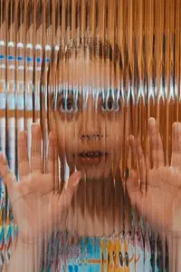 Girl Looking Up and Glass with Hands
