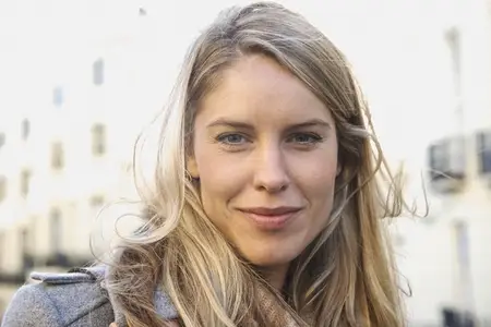 Close up portrait of beautiful blond woman in city street