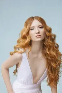 Formal portrait of beautiful sexy young woman with long