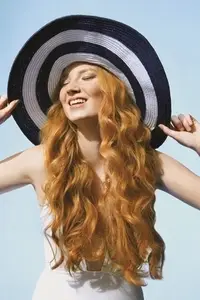Portrait of carefree young woman with long