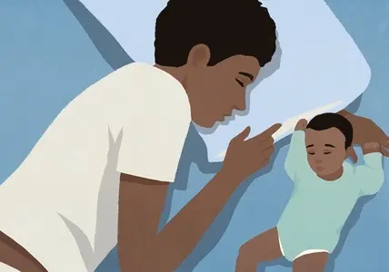 View from above of tired father and newborn son sleeping in bed at night