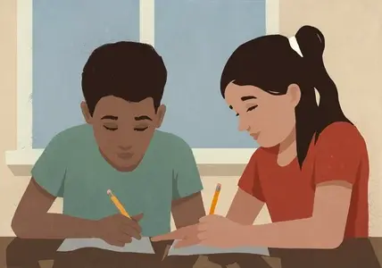 Multiracial students doing homework next to each other in classroom